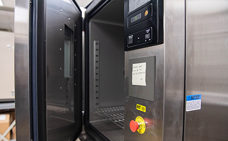 An incubation oven with the door ajar
