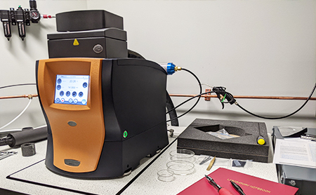 Dynamic Material Analyzer equipment in use during an experiment